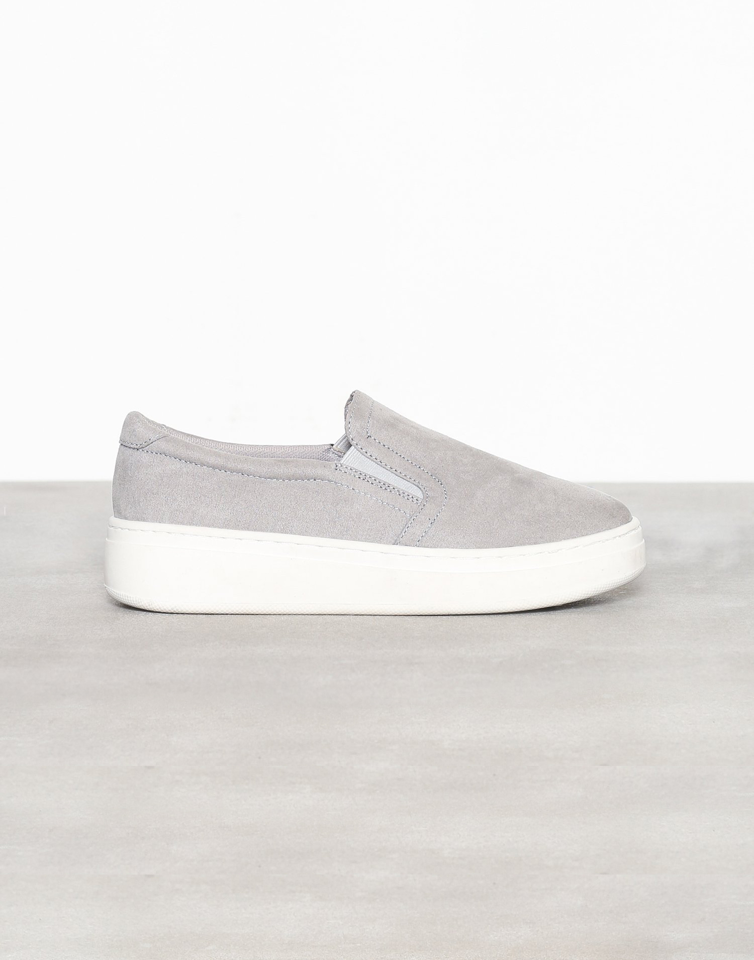 Grey suede slipins